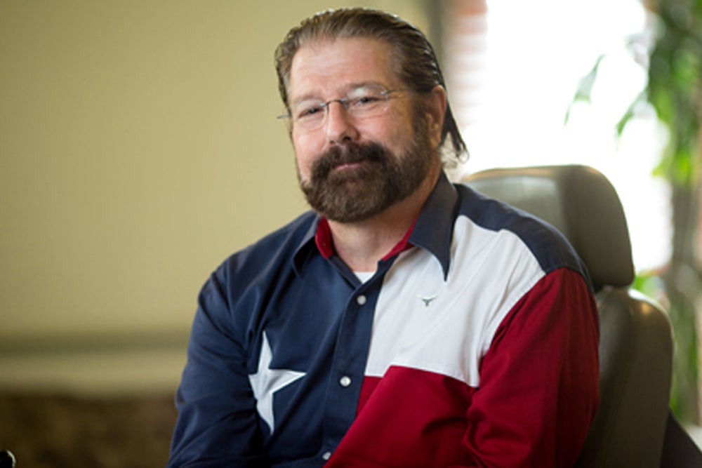 Carl Knowlan wearing shirt depicting the Texas flag