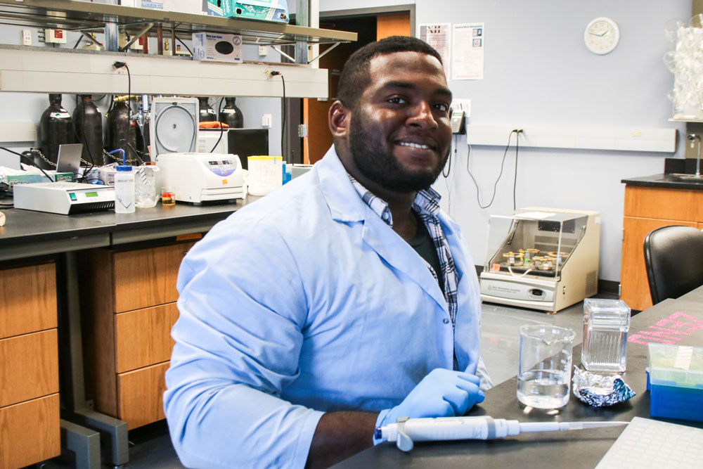 Wade Zeno smiling in lab