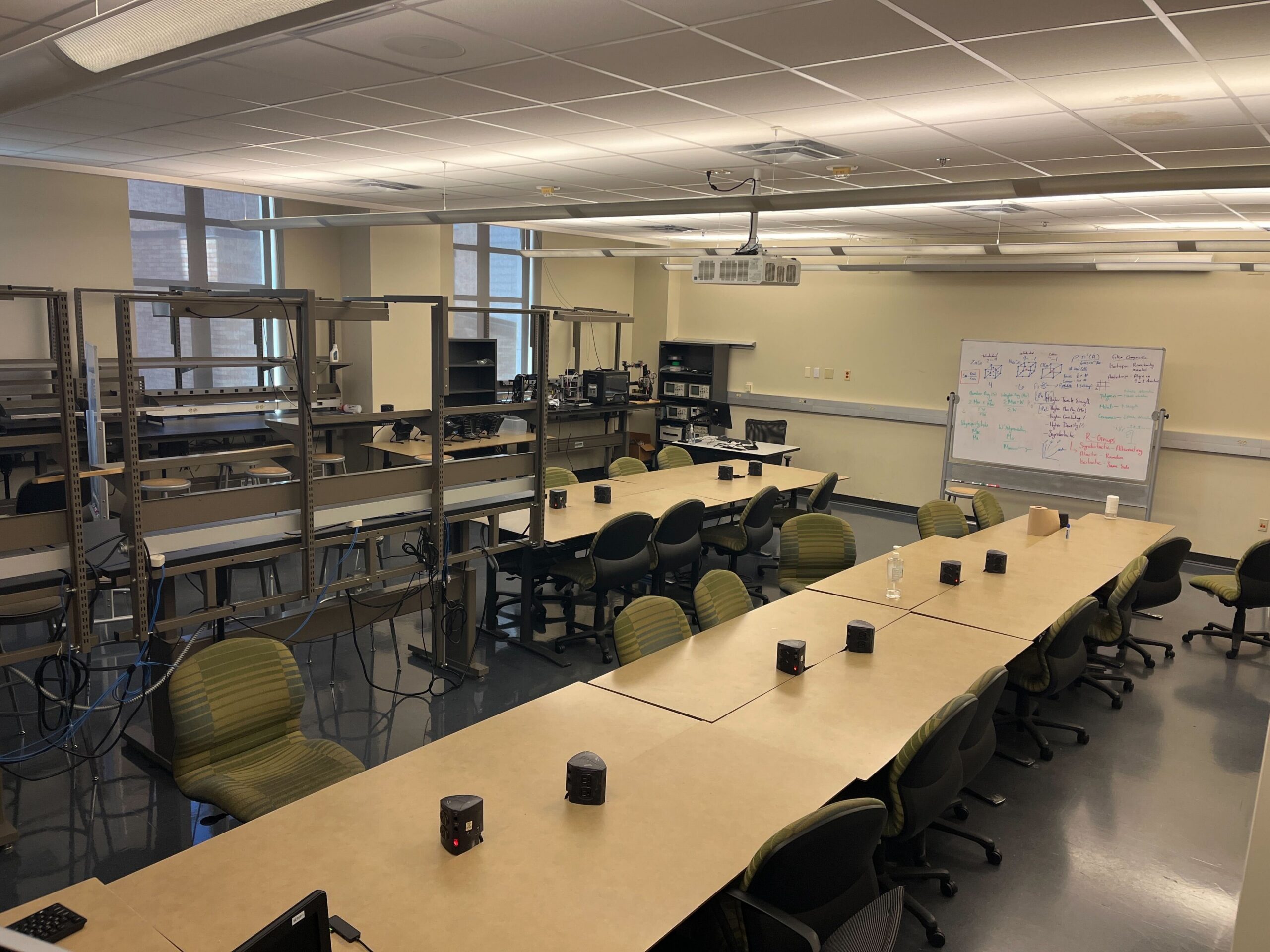 An empty room with tables and lab work stations in BME 3.312