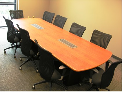An empty conference room table in BME 5.202I with 10 chairs