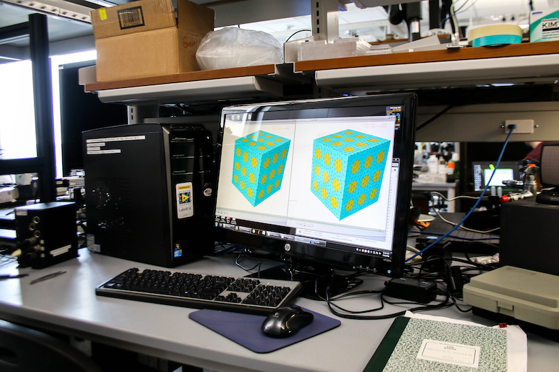 computer monitor showing two cubes with rows of dots on each side