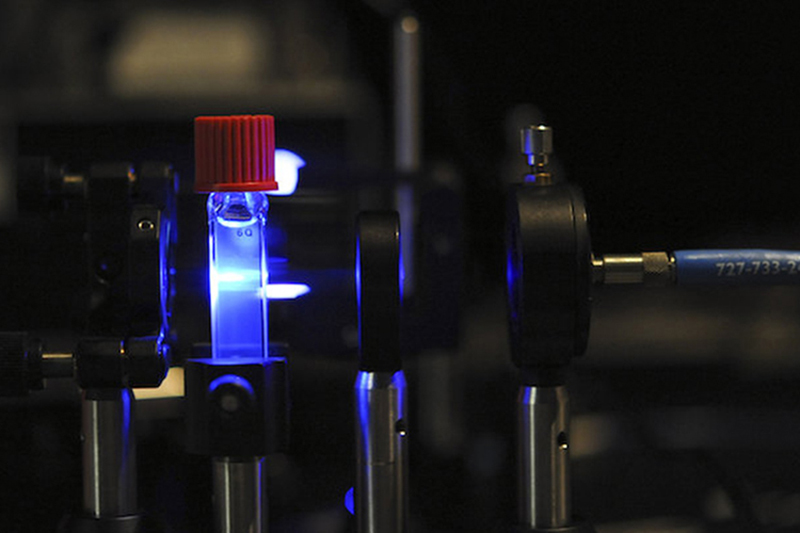 a machine flashing a laser between two points