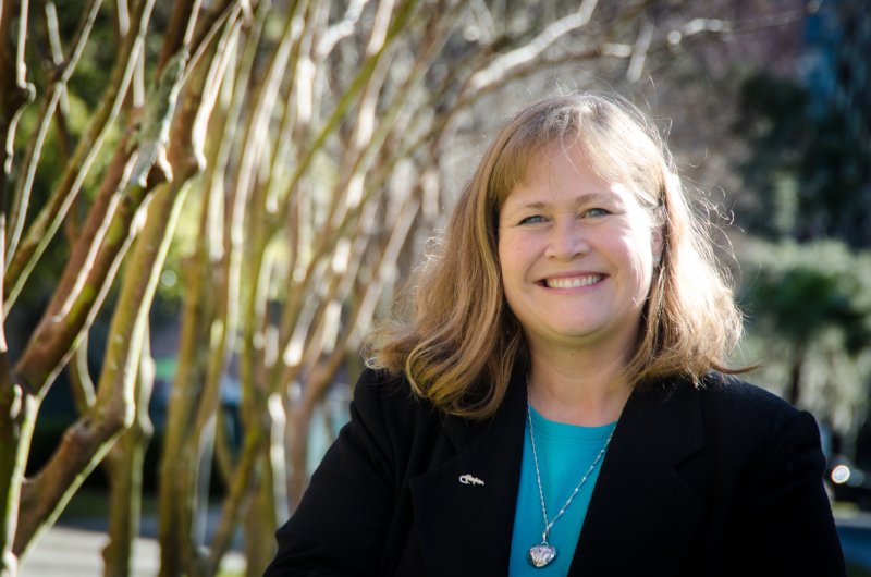 Former UT Austin Biomedical Engineering professor Christine Schmidt standing outside.