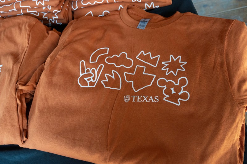 An orange UT Austin T-Shirt