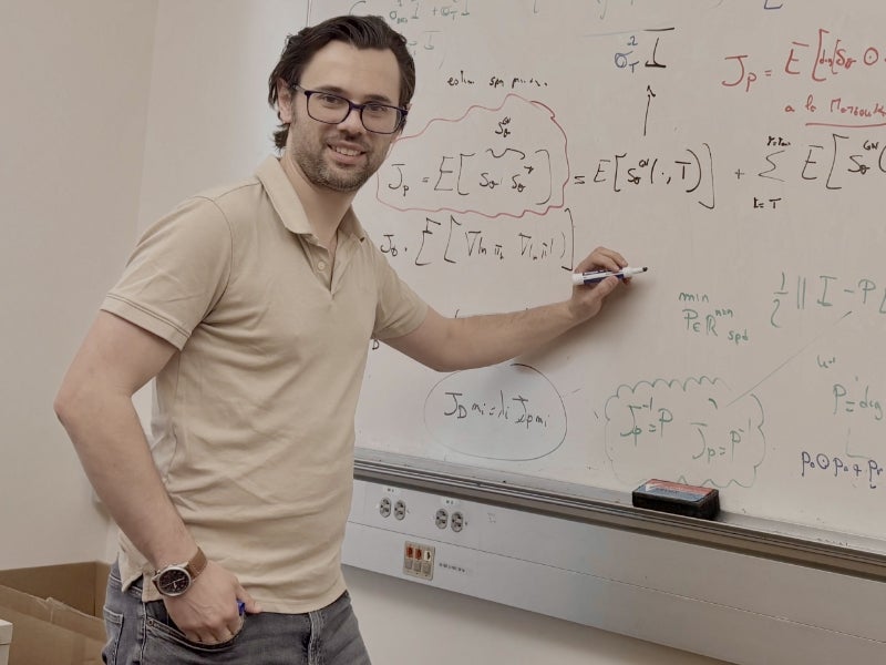 BME Professor Umberto Villa standing at whiteboard teaching class