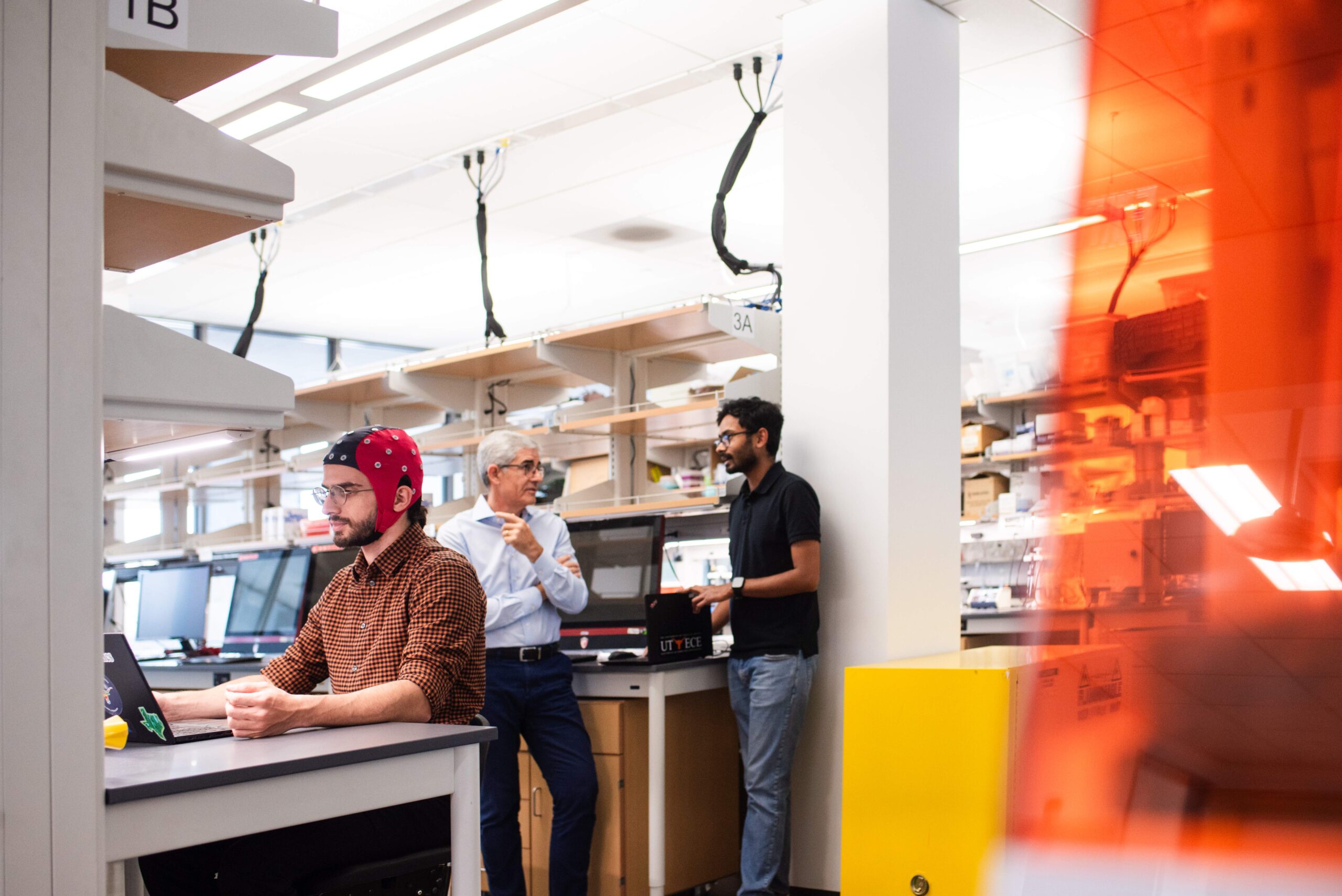 Students testing biomedical engineering equipment in a lab at UT Austin