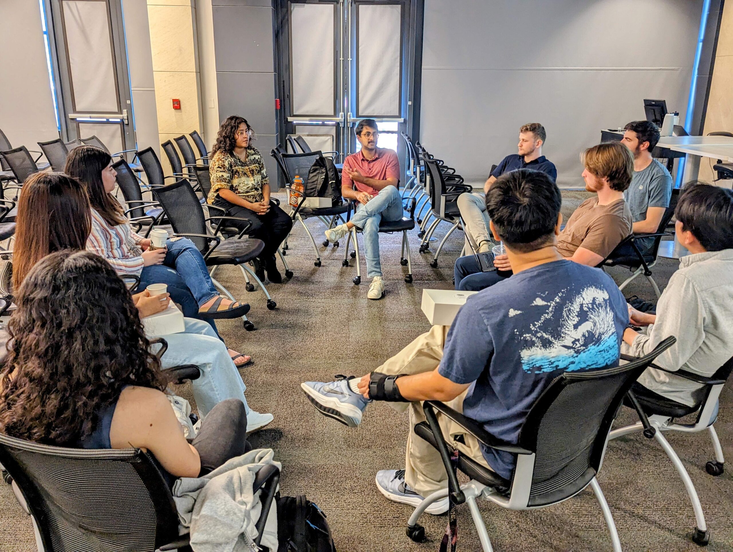 Students sitting in a circle at Texas BME
