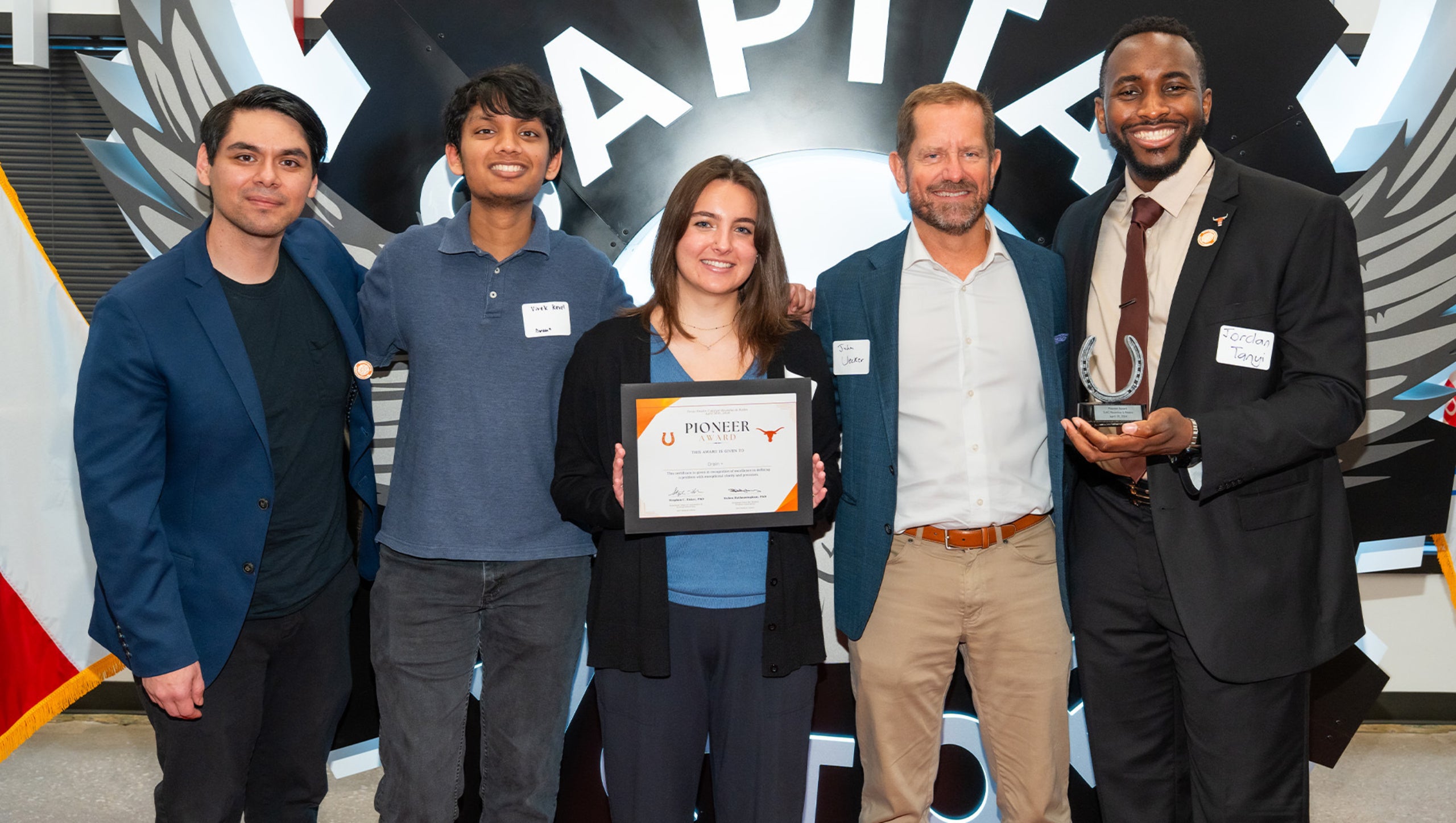 UT BME graduate students holding Texas Health Catalyst award
