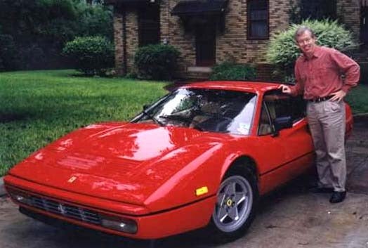 BME professor emeritus Ken Diller posing by a Ferrari