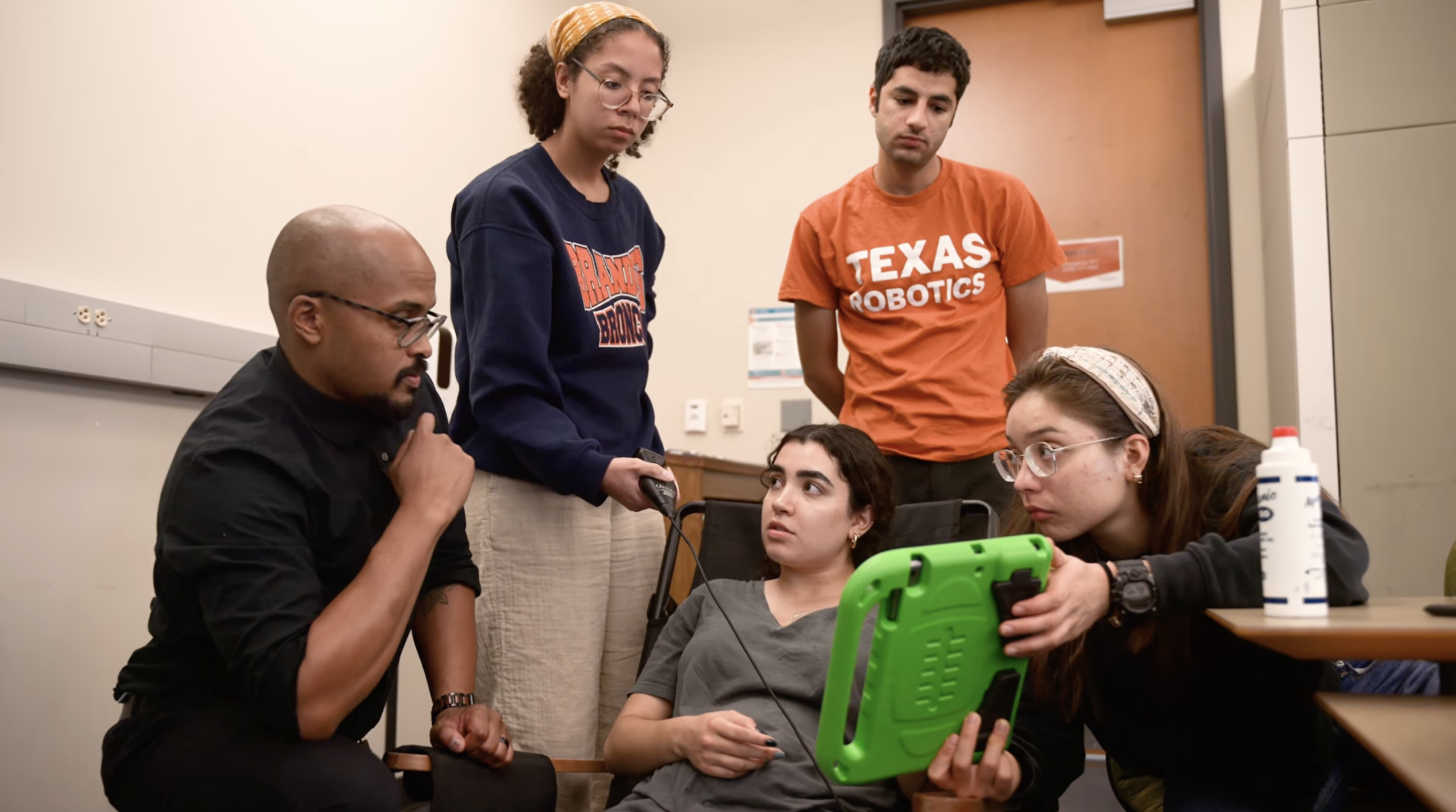 BME assistant professor Adam Bush teaches BME students about ultrasound technology
