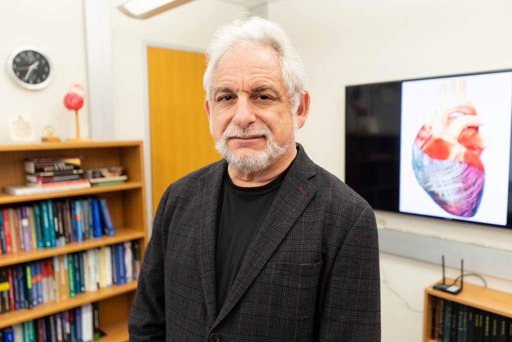 Michael Sacks smiling wearing black shirt